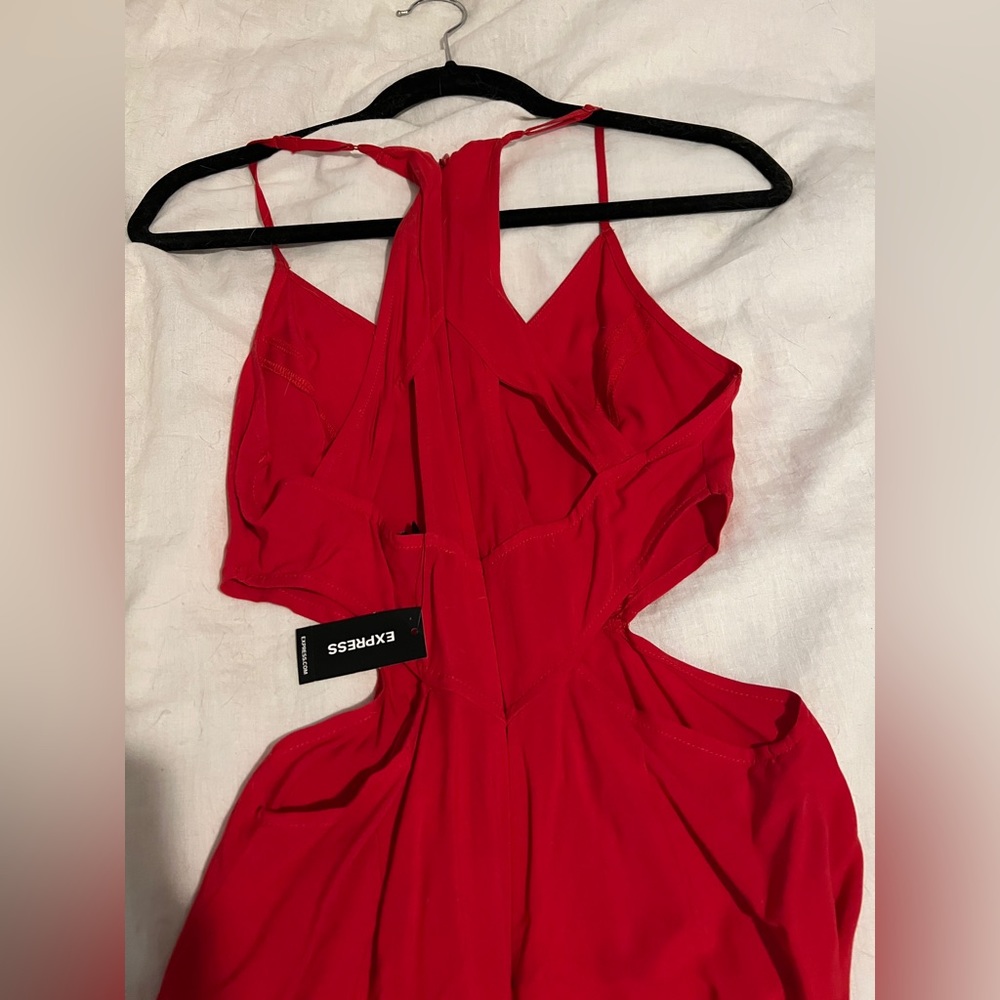 XS Express red romper. New with tags. Never worn.